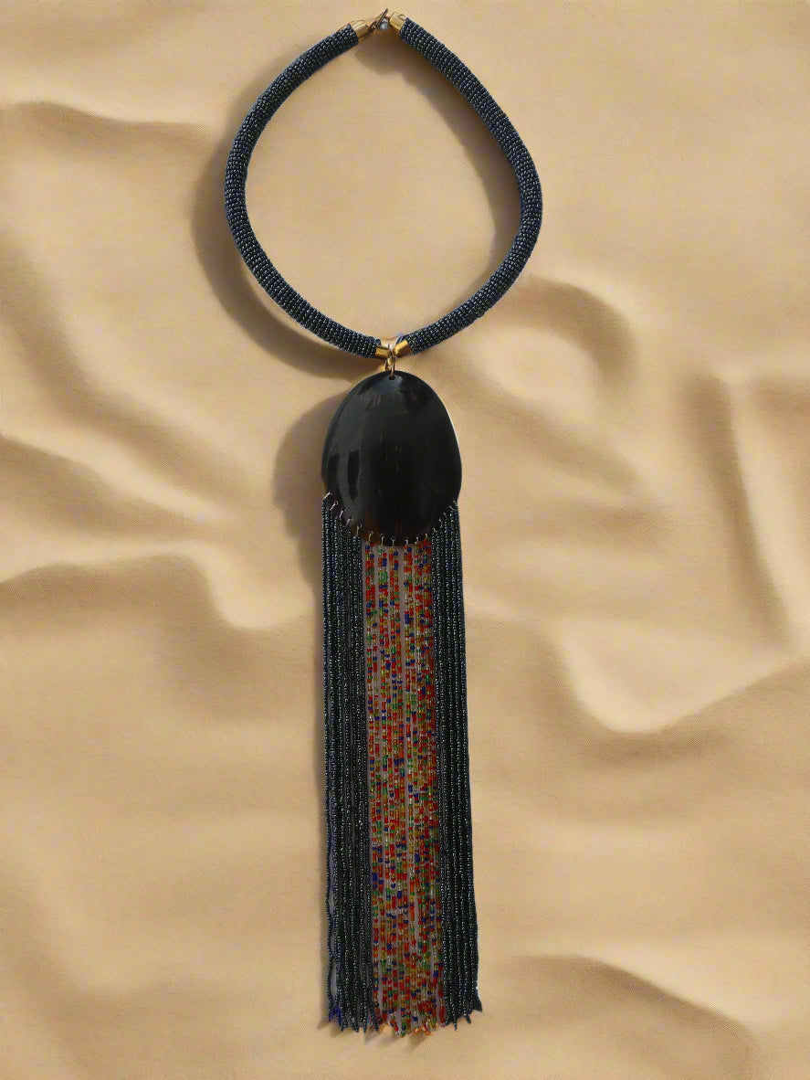 Beaded Necklace with Horn pendant